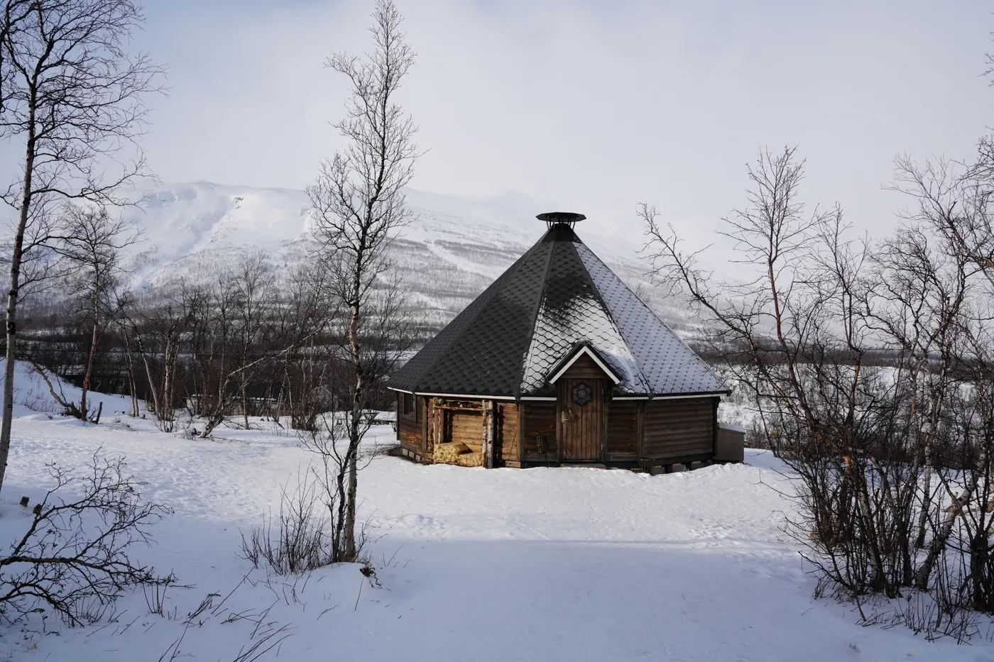 An outdoor sauna exposed to winter freeze-thaw