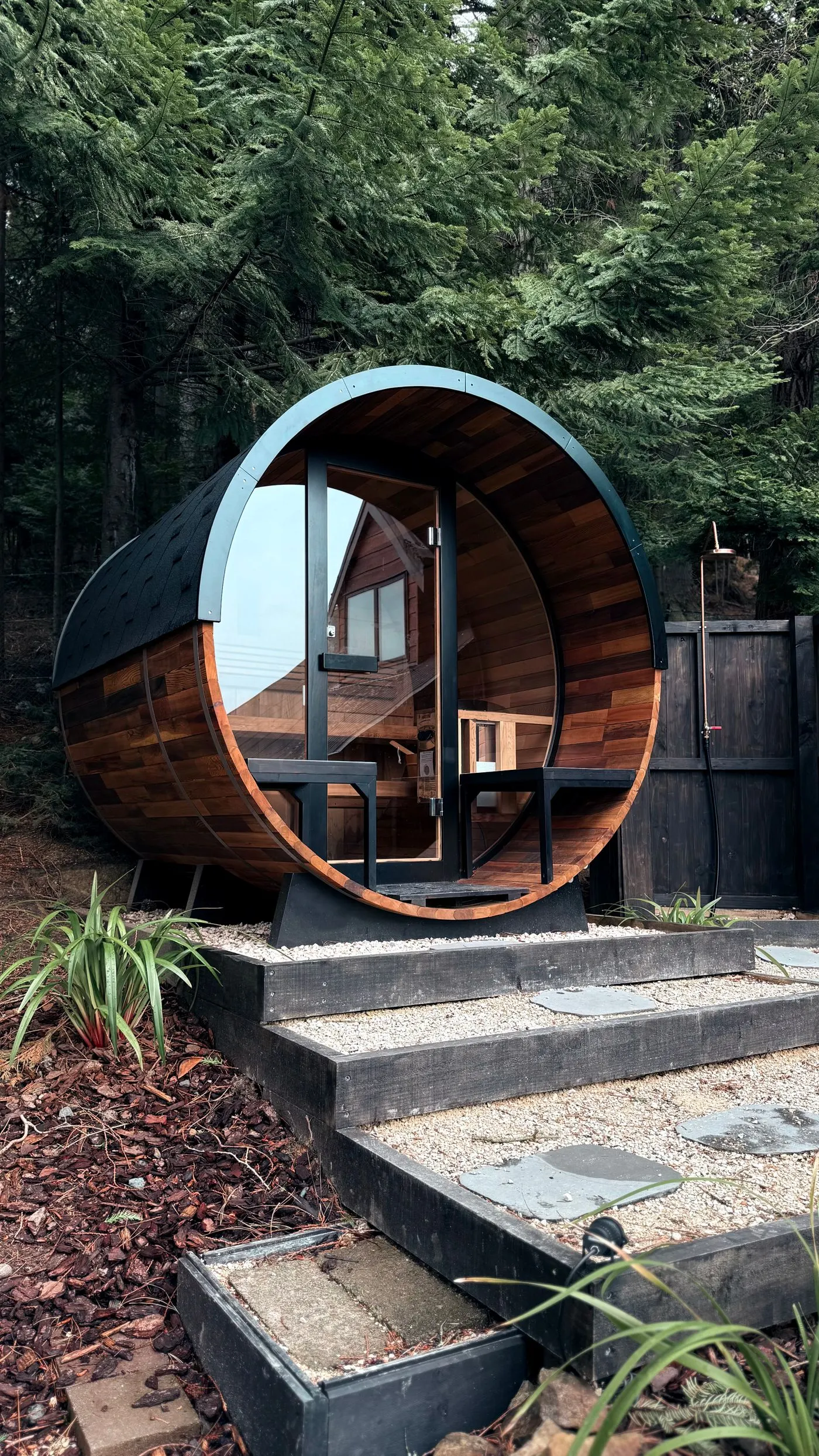 Stone steps leading to an outdoor sauna site